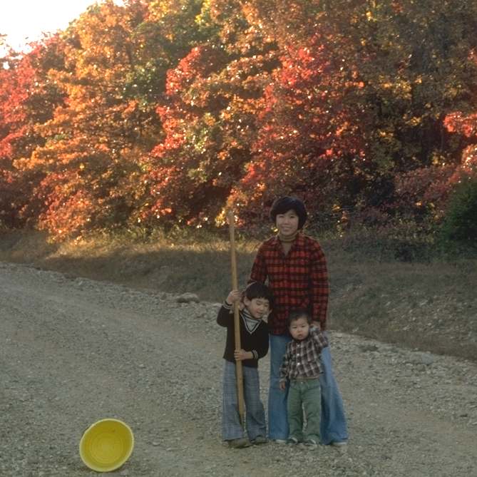 Kim with kids at Fort Leonard Wood in autumn 1978