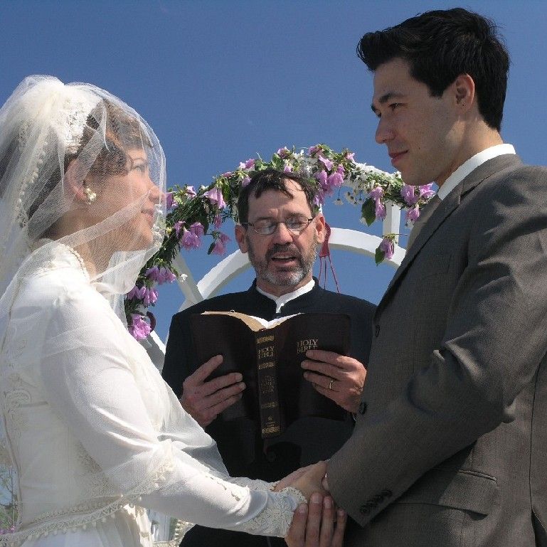 Chris presiding at the Wedding of Dilia & Simon