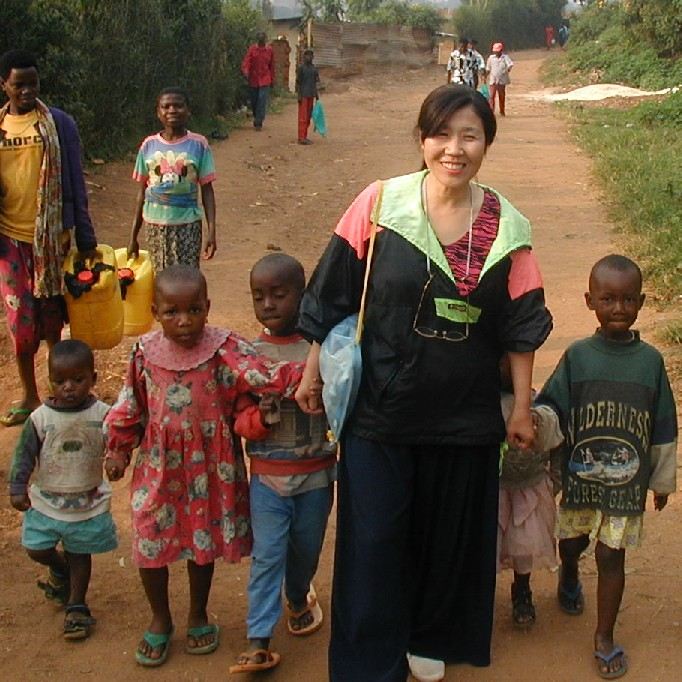 Kim walking in Kigali, Rwanda in 2001