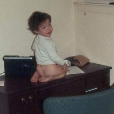 Zachary climbing on desk in Longview ~ 1976